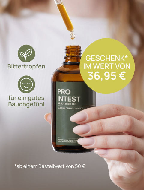 A hand is holding an amber glass bottle of the herbal bitter “Pro Intest” by TISSO, while a pipette holds a drop over it, accompanied by text such as “Bitter drops for a healthy gut” and a yellow note reading “GIFT WORTH 36.95 euros with orders of 50 euros or more”